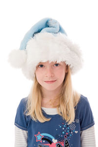 Portrait of girl wearing hat against white background