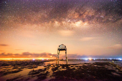 Scenic view of sea against sky at night