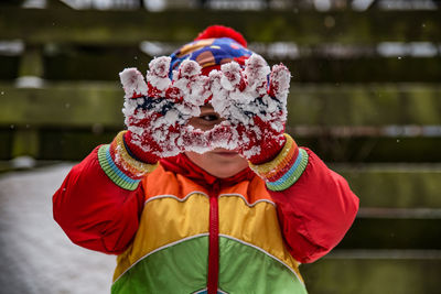 Midsection of man standing in snow