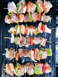 High angle view of leaves on barbecue grill