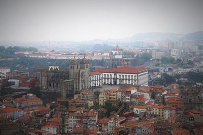 High angle view of buildings in city against clear sky