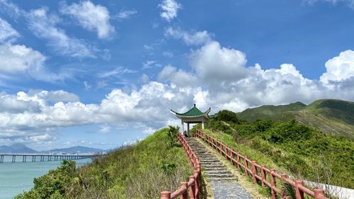 Panoramic view of footbridge against sky