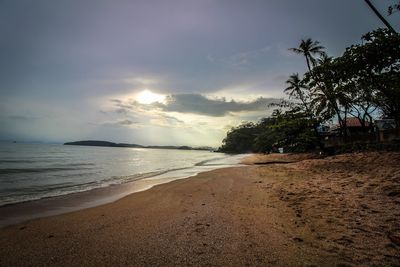 Scenic view of sea against sky at sunset