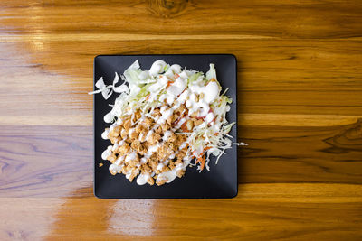 High angle view of food on wooden table