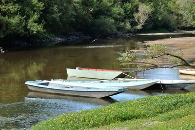 Boat moored in lake