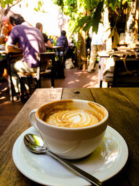 Coffee served on table at cafe