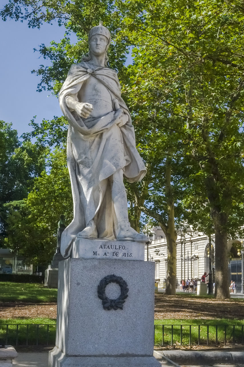 sculpture, statue, tree, plant, human representation, architecture, representation, art, no people, nature, day, monument, memorial, male likeness, craft, park, travel destinations, creativity, park - man made space, city, outdoors, history, the past, sky, built structure, travel