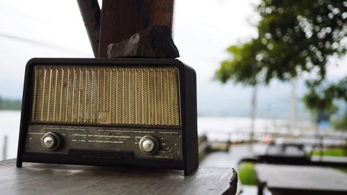 Close-up of telephone on table