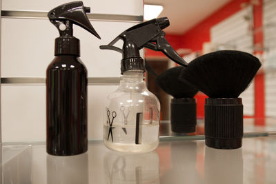 Close-up of bottles on table at home