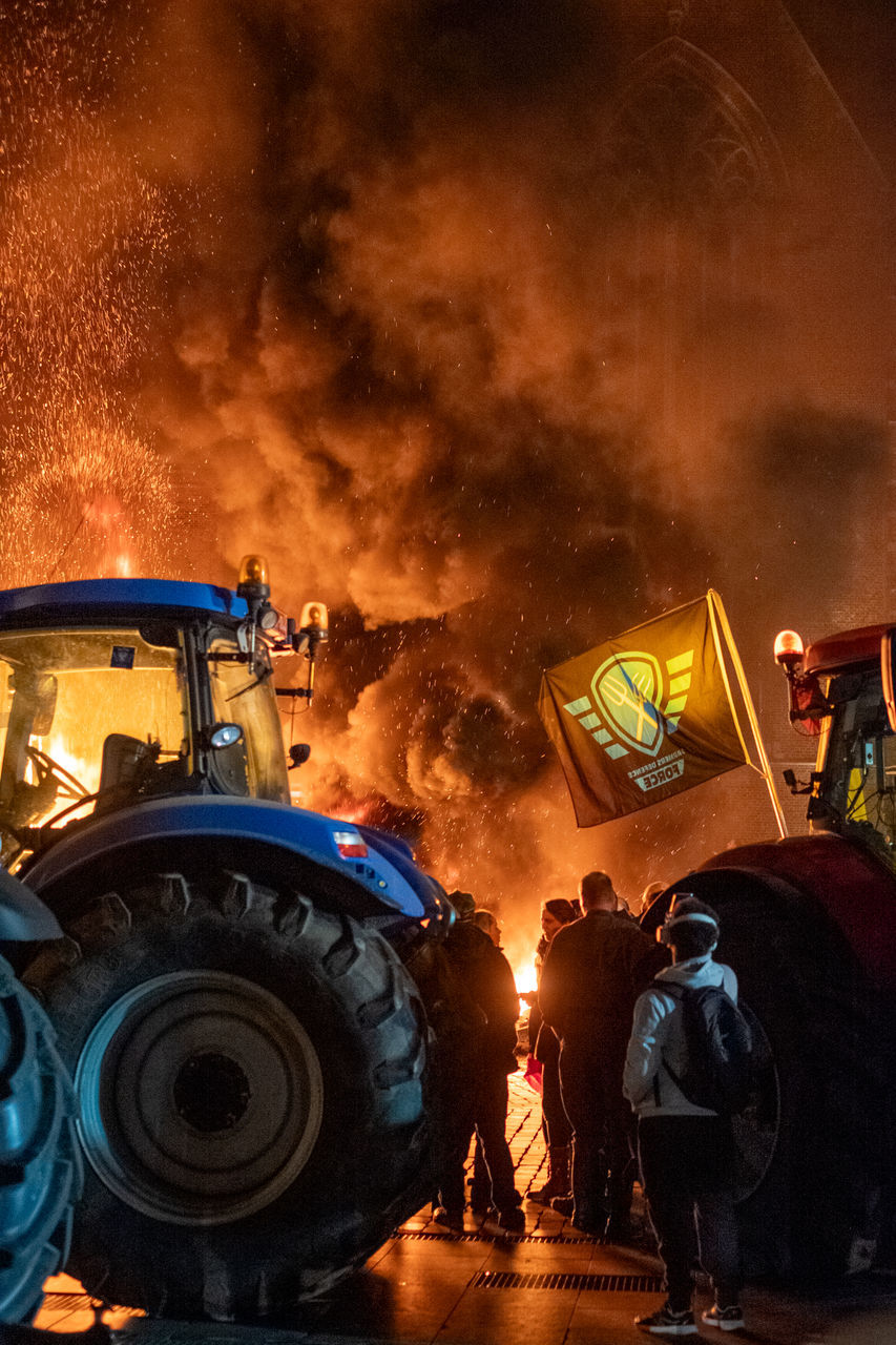 occupation, transportation, screenshot, mode of transportation, accidents and disasters, night, men, tractor, adult, firefighter, group of people, motor vehicle, land vehicle, burning, working, nature, car