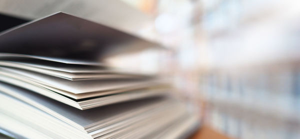 Close-up of stack of books on table