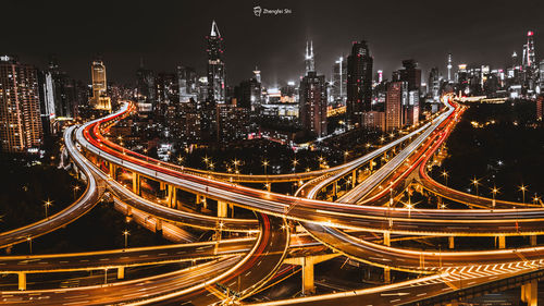 High angle view of illuminated cityscape at night