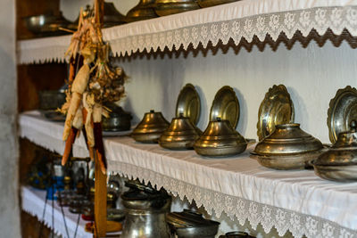 Statues on table in building