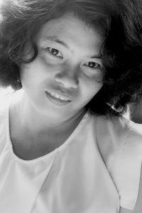 Close-up portrait of smiling woman