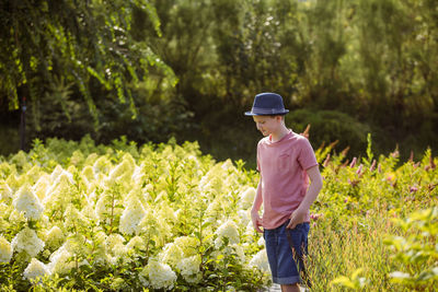 Boys standing on field