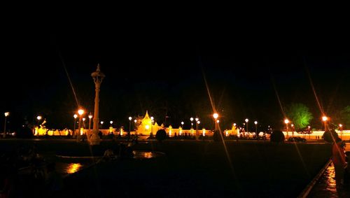 Illuminated street light at night