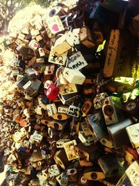 Close-up of padlocks hanging on railing