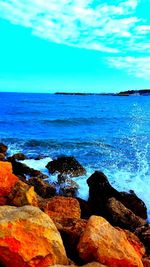 Scenic view of sea against blue sky