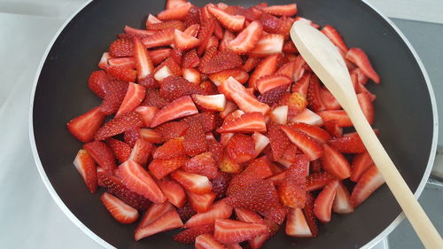 Close-up of strawberry slices in cooking pan