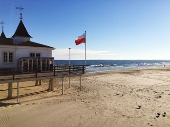 View of beach against blue sky