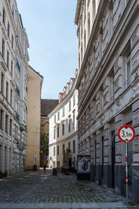 Street in city against sky