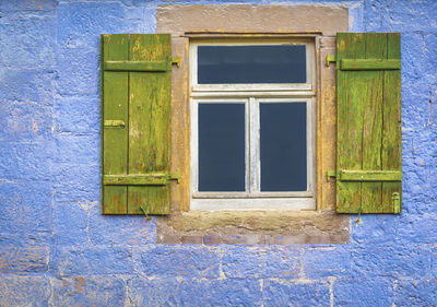 Close-up of the window of an old residential building