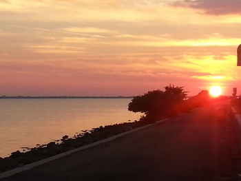 Scenic view of sunset over sea