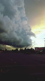 Cloudy sky over road