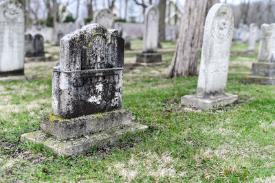 Vintage cemetery graveyard and gravestones