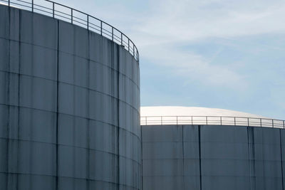 Low angle view of factory against sky