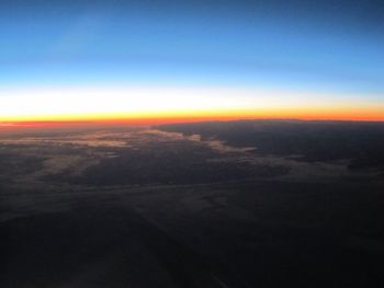 Aerial view of landscape at sunset