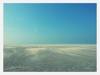 Scenic view of landscape against clear blue sky