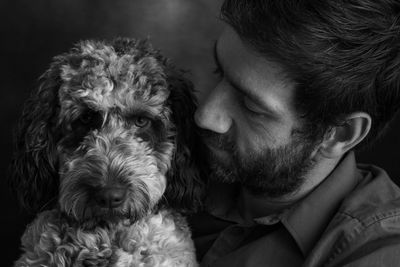 Close-up of man with dog