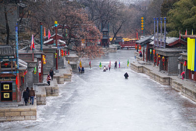 Group of people in city during winter