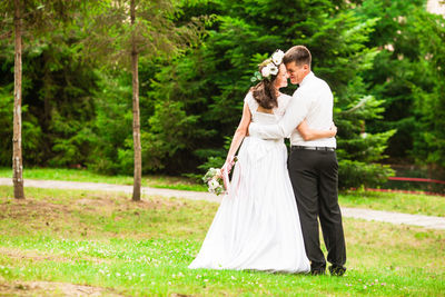 Couple kissing in park