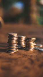 Close-up of coins on table