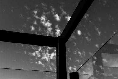 Low angle view of sky seen through glass window