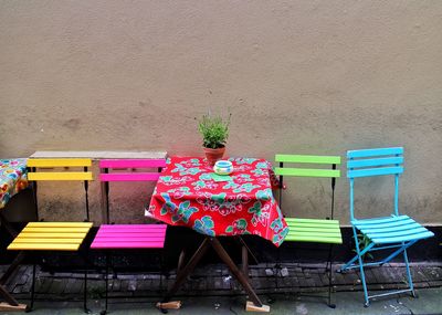 Multi colored chairs on beach