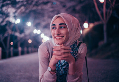 Portrait of smiling young woman