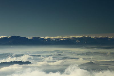 Scenic view of mountains against sky during sunset