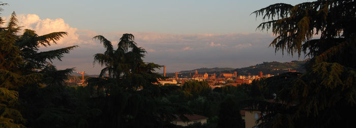 Panoramic view of townscape against sky during sunset