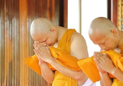 Monks having ordination ceremony at temple