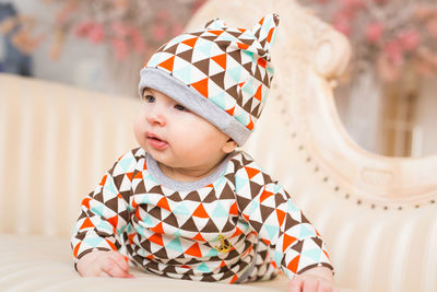 Portrait of cute boy looking away