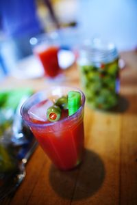 Close-up of red object on wood
