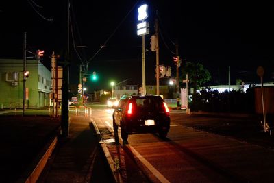 Illuminated street light at night