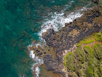 High angle view of rocks on beach