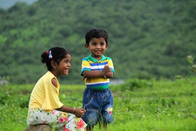 Boys on grassy field