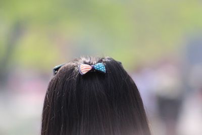 Rear view of woman wearing hairpin