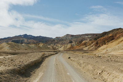 Road leading towards mountains