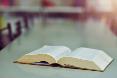 Close-up of open book on table